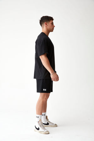 POLERA OVERSIZE NTVA™ NEGRA
