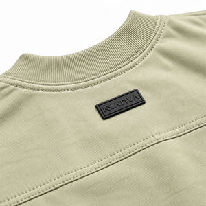 POLERA OVERSIZE BASIC OLIVA® 100% ALGODÓN