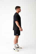 POLERA OVERSIZE NTVA™ NEGRA
