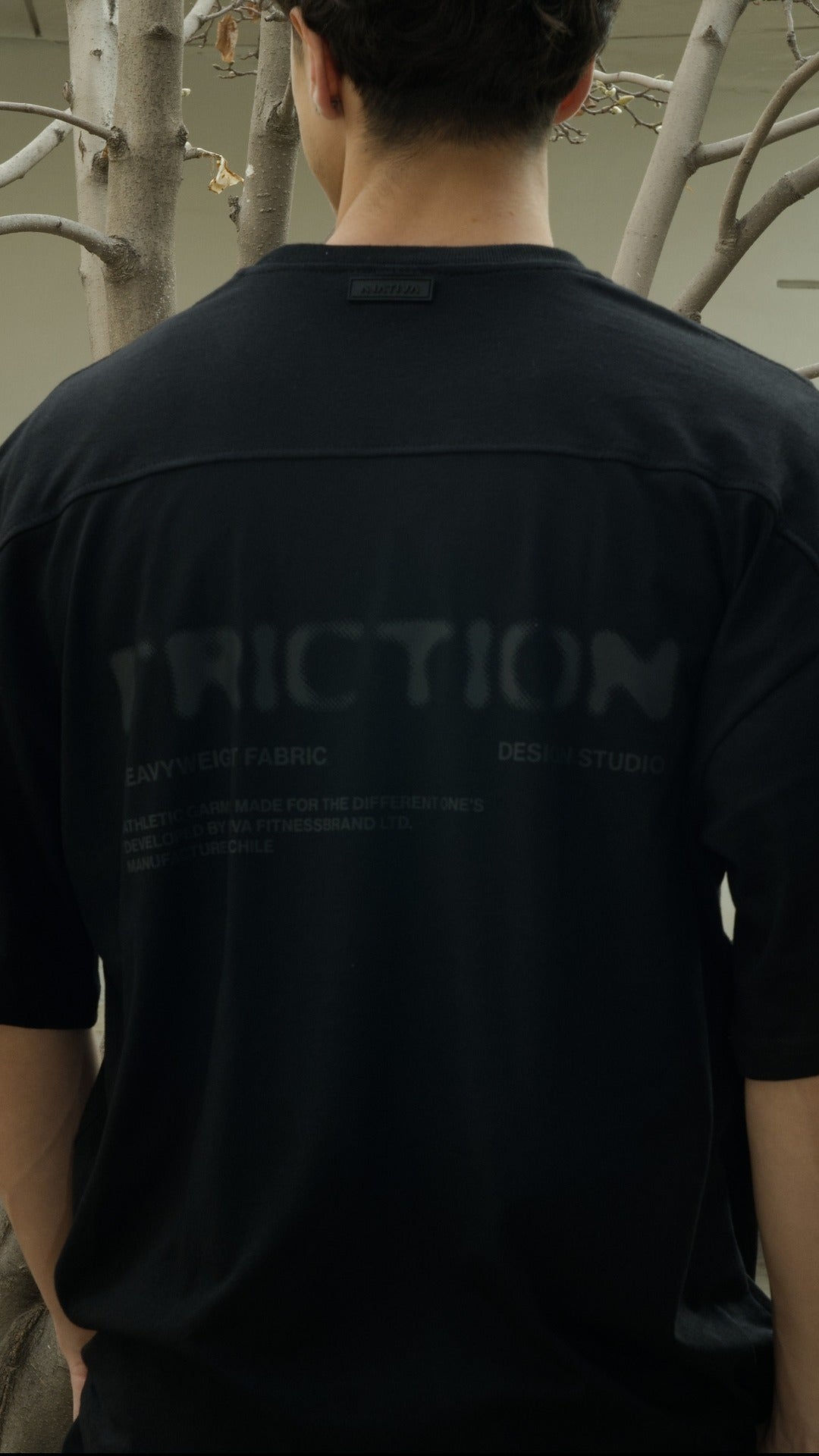 POLERA OVERSIZE FRICTION NEGRA