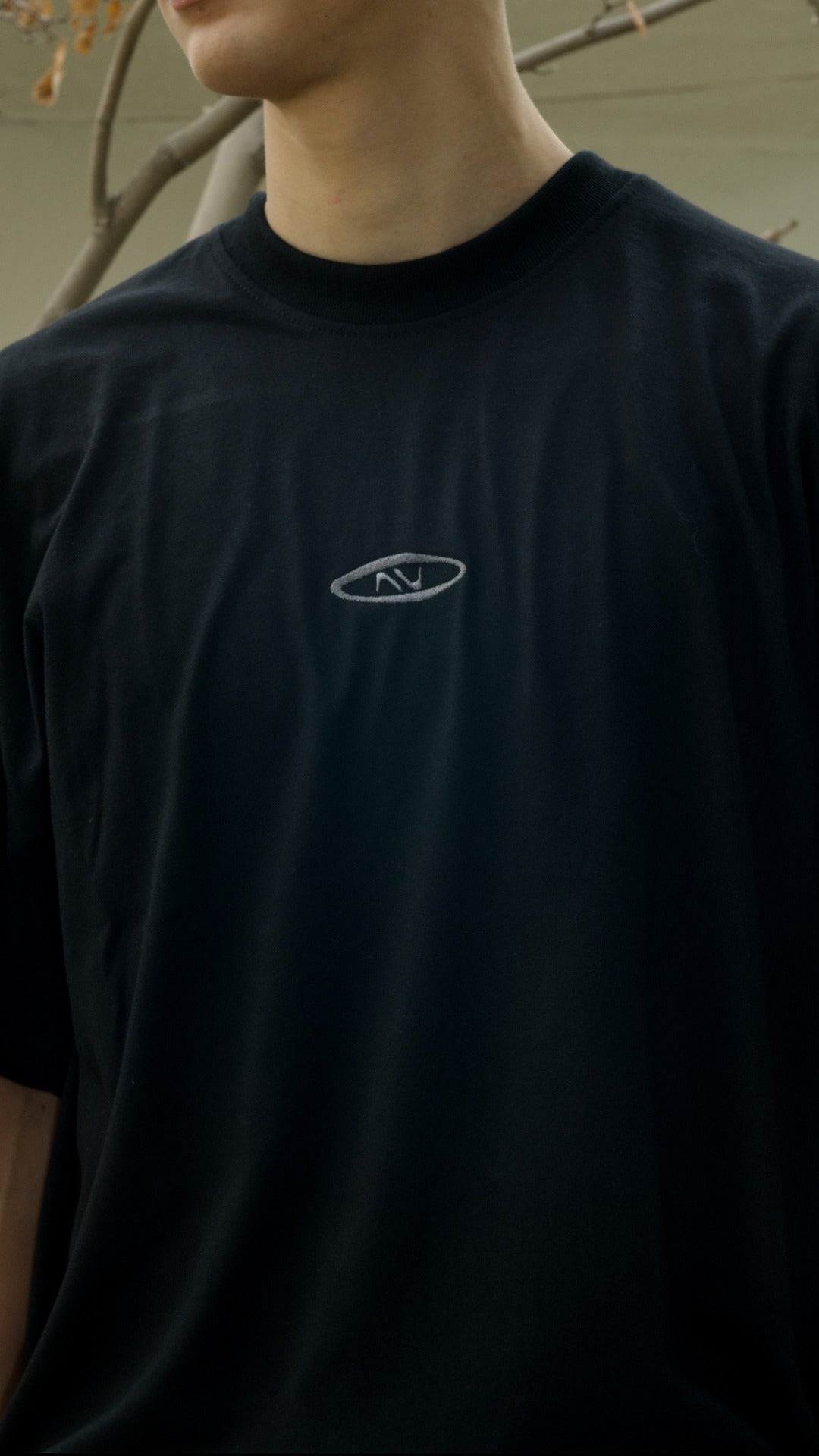 POLERA OVERSIZE FRICTION NEGRA