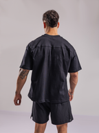 Polera Oversize Unfair™ Negra — modelo | Nativa Elements