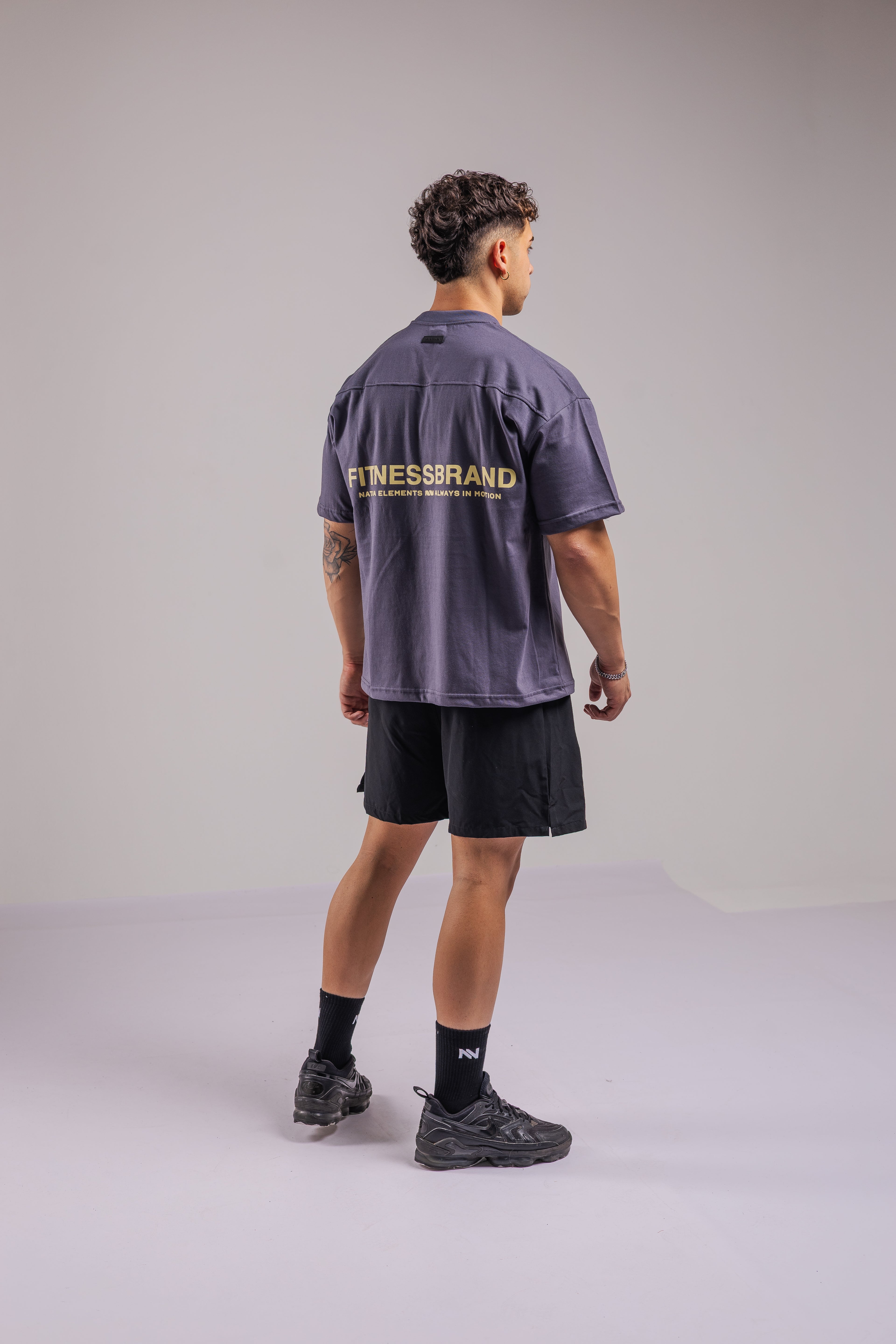 POLERA FITNESSBRAND™ OVERSIZE PLOMA