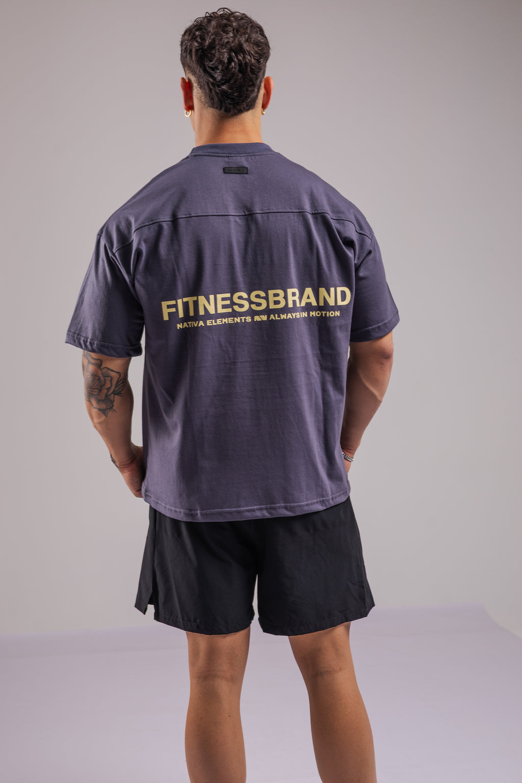 POLERA FITNESSBRAND™ OVERSIZE PLOMA