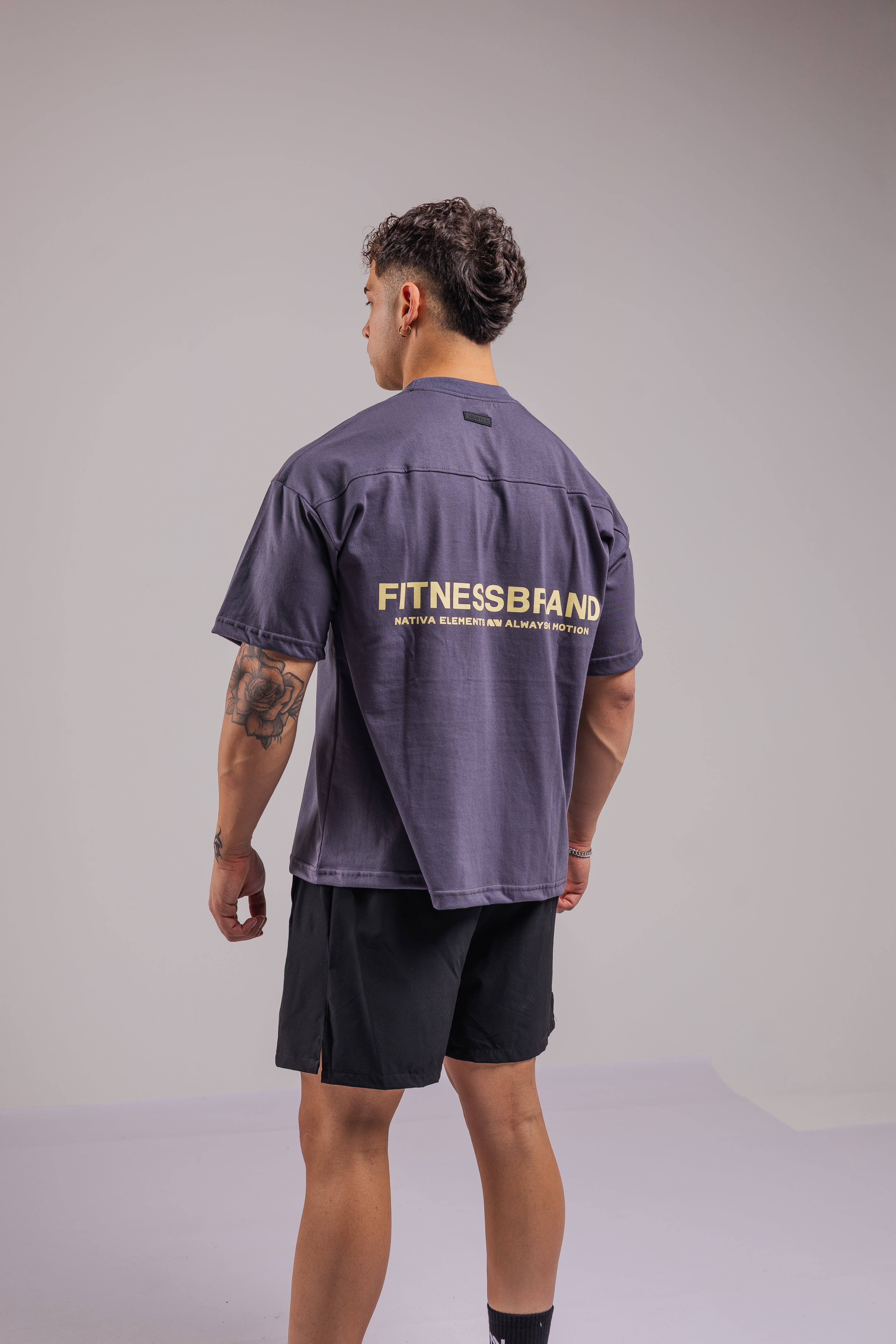 POLERA FITNESSBRAND™ OVERSIZE PLOMA