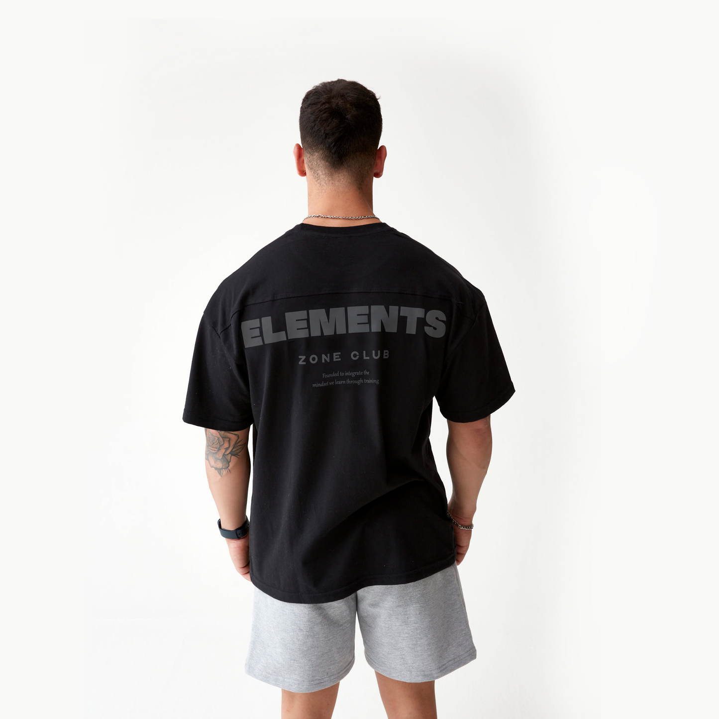 POLERA OVERSIZE ELEMENTS™ OBSIDIANA