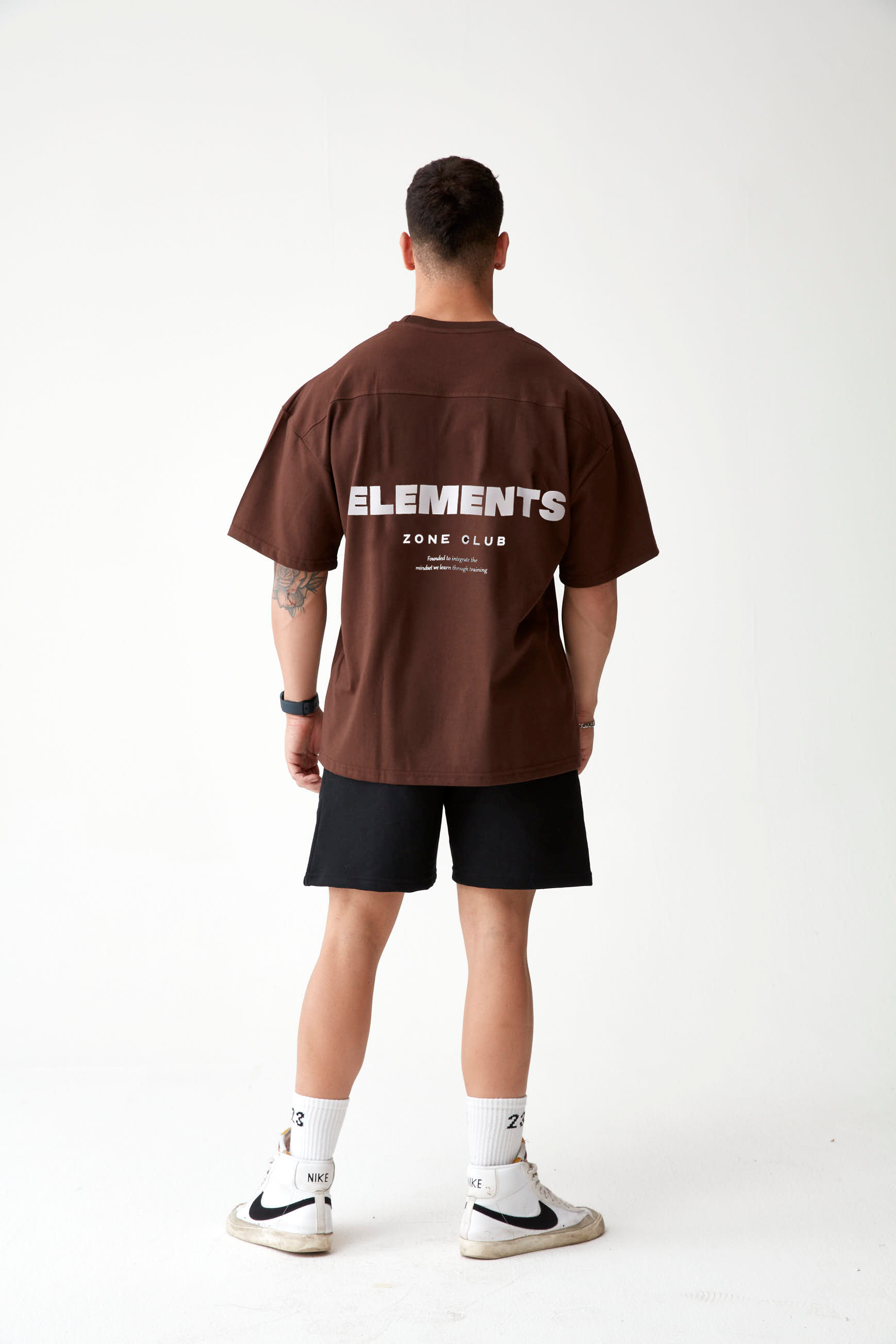 POLERA OVERSIZE ELEMENTS™ CAFE